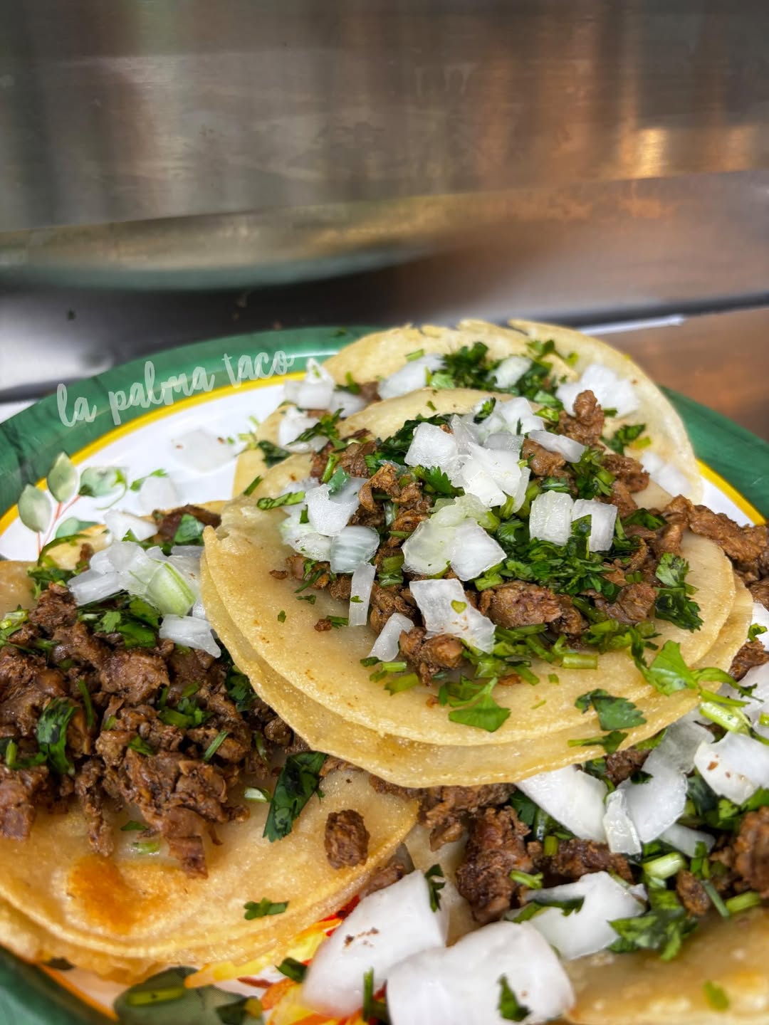 La Palma street tacos loaded with meat, onion and cilantro